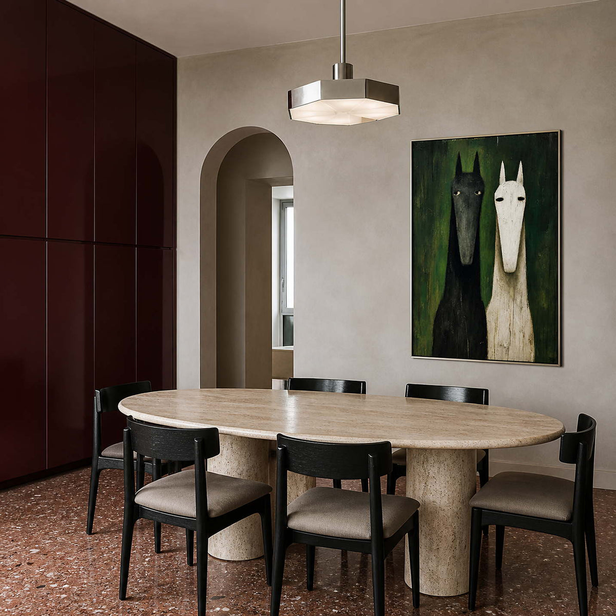 Two-horse wall art displayed above a sculptural modern dining table.