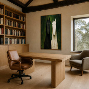Two stylized horses displayed in a light wood home office.