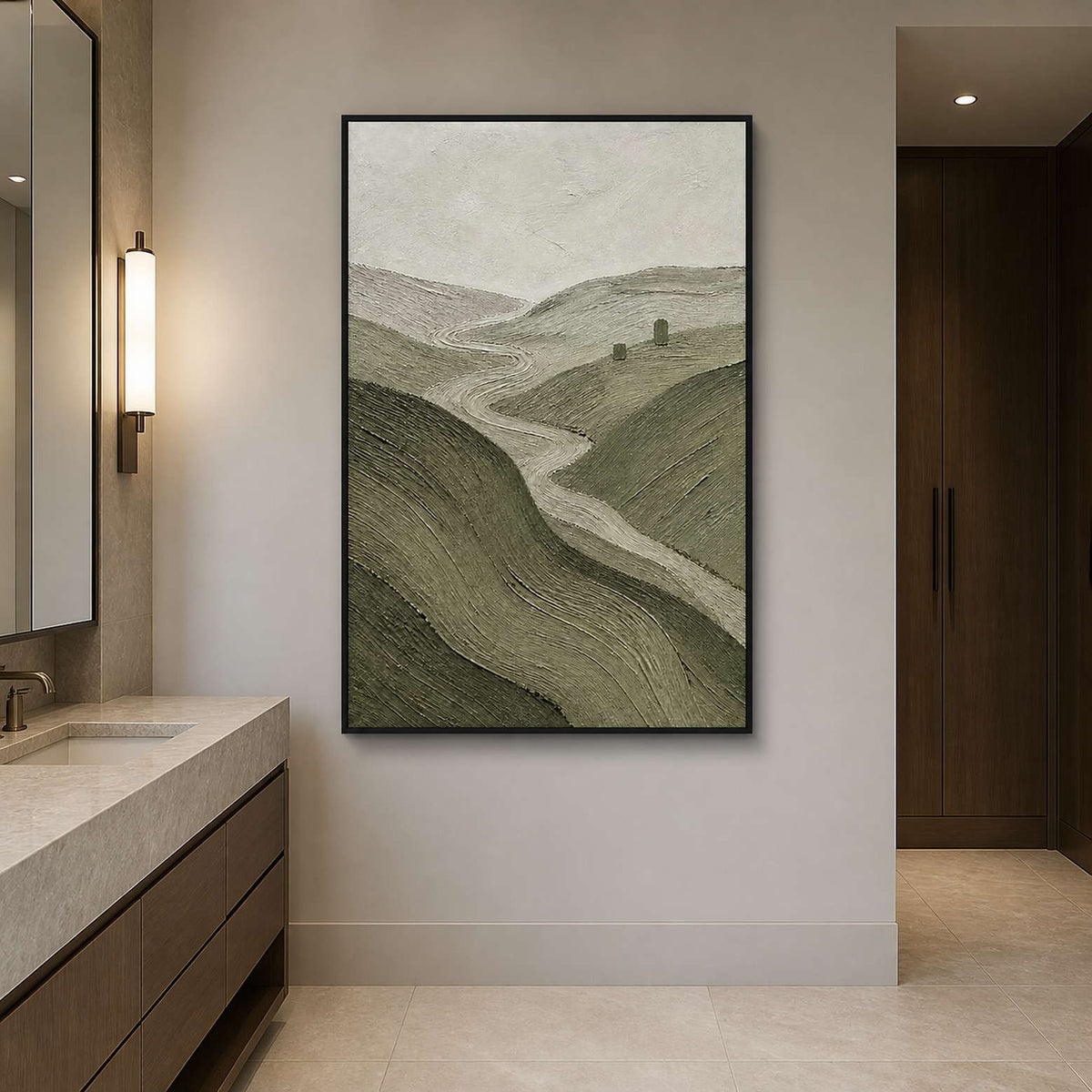 Textured olive hill wall art in a refined bathroom with a black frame.