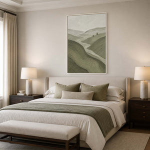 Calming textured hill wall art above a serene bedroom with a white frame.