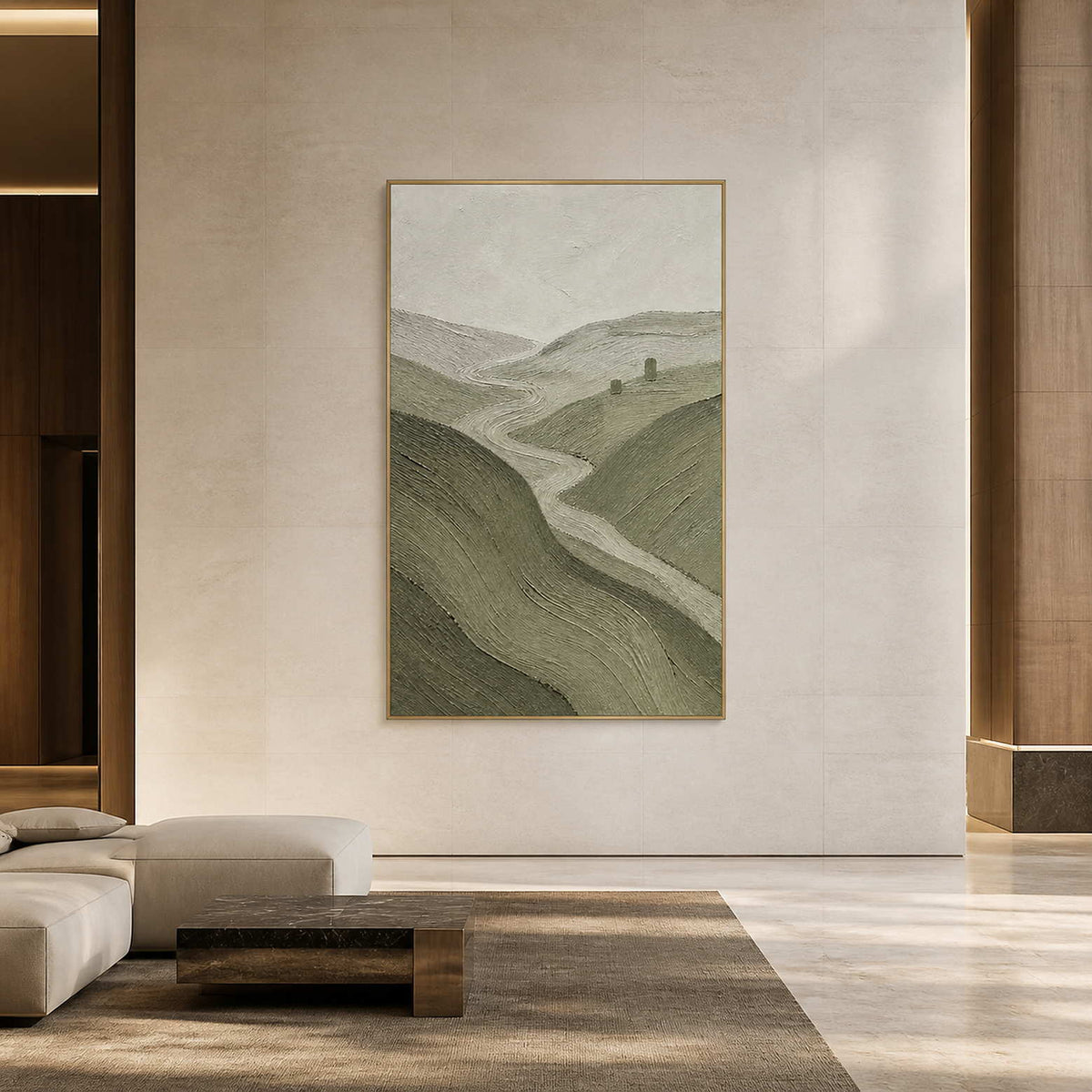 Large vertical landscape wall art in a modern hotel lobby with a gold frame.