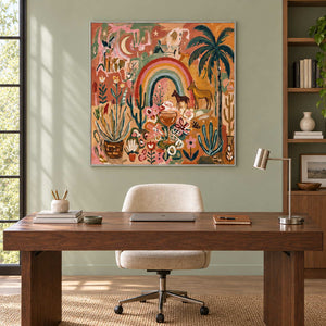 Under the Rainbow in a silver frame above a wood desk and cream swivel chair against a sage wall.