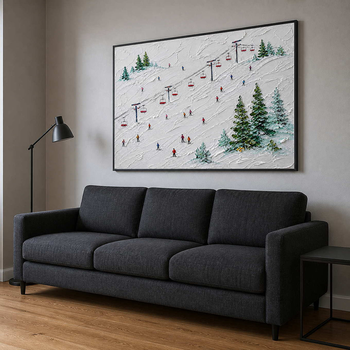 Playful alpine ski canvas above a charcoal family room sofa.