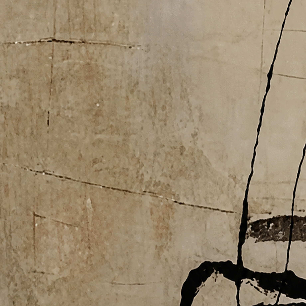 Close-up of weathered cream and sand texture crossed by a black line.