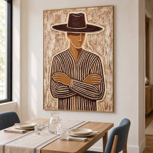 Brown striped portrait beside a wooden dining table with blue chairs and a glass carafe.