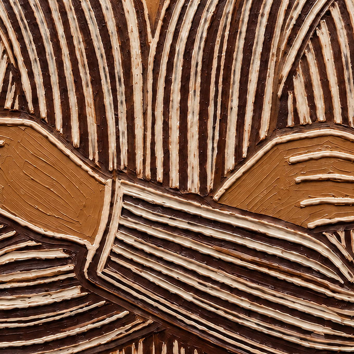 Close-up of outlined fingers and cream ridges following the crossed brown sleeves.