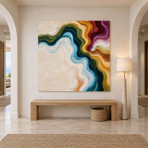 Flowing-color painting above a wood bench and woven basket between arched openings.