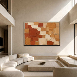 Terracotta, ochre, and cream painted blocks wall art in a contemporary living room.
