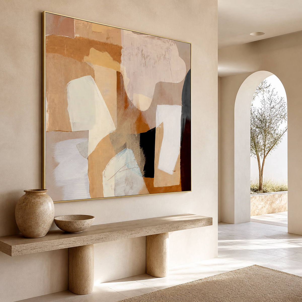 Warm abstract painting above a narrow console beside a sunlit archway.
