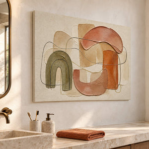 Boho abstract painting with olive, terracotta, blush, and sand arches without an outer frame beside a bathroom vanity.