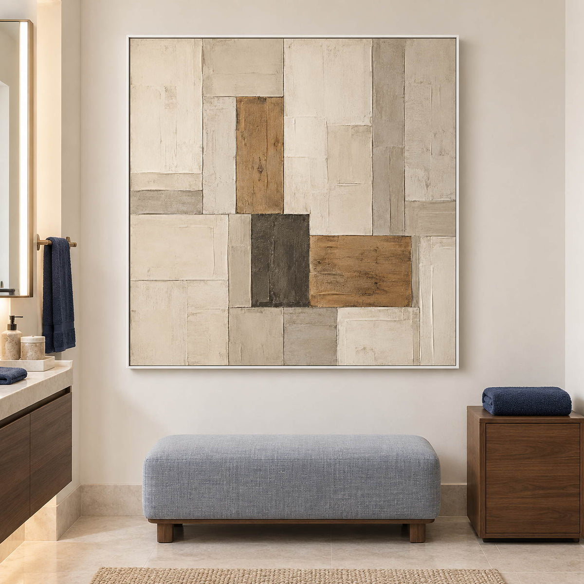 Textured ivory stone caramel and charcoal blocks in a quiet square composition, displayed in a bathroom dry area in a white frame.