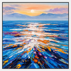 Square seascape with a low sun, distant blue mountains, peach sky, and textured blue water streaked with warm reflections.