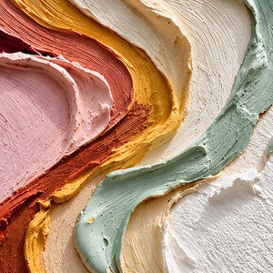 Detail of pink, orange, yellow, and pale green ridges beside white texture.