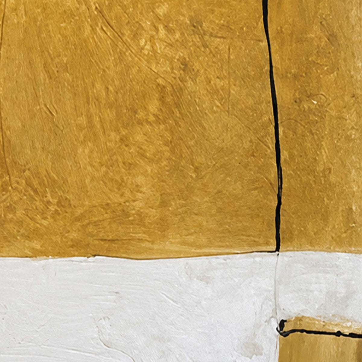 Close view of ochre brushwork, cream paint, and a thin black dividing line.