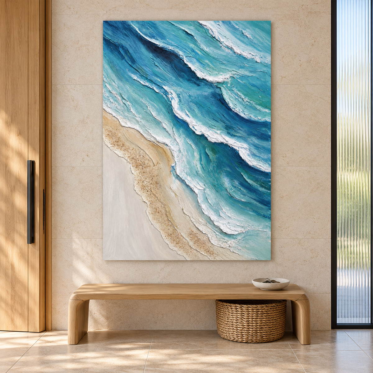 Artwork showing layered blue-green waves with raised white edges beside a pale sandy shore in an entryway above a console or bench, with no outer frame.