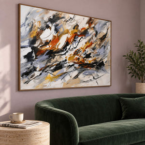 Hand-painted abstract artwork with black gestures and rust, ochre, ivory, and gray layers, displayed in a hotel lounge in a brown wood frame.