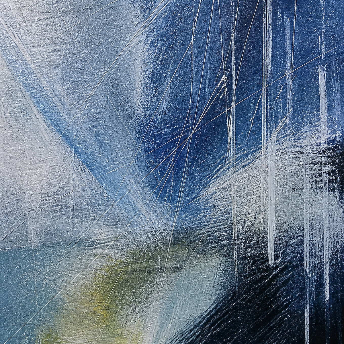 Close-up of cobalt paint, scraped white layers, and fine linear marks.