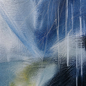 Close-up of cobalt paint, scraped white layers, and fine linear marks.
