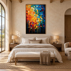 Bright abstract circles above a cream bed beneath exposed ceiling beams.
