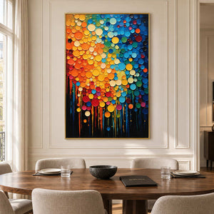 Bright circular abstract on a cream paneled dining-room wall above a wooden table.
