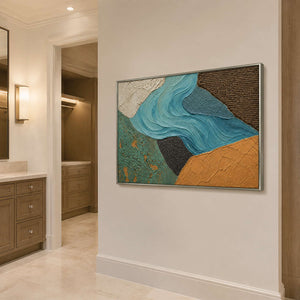 Coastal abstract canvas displayed in a calm modern bathroom.