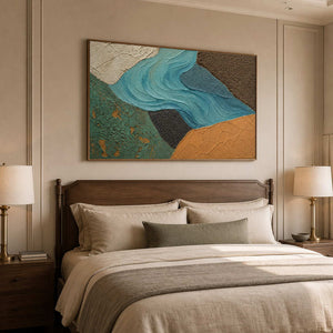 Turquoise and earth-toned artwork styled above a quiet bedroom.