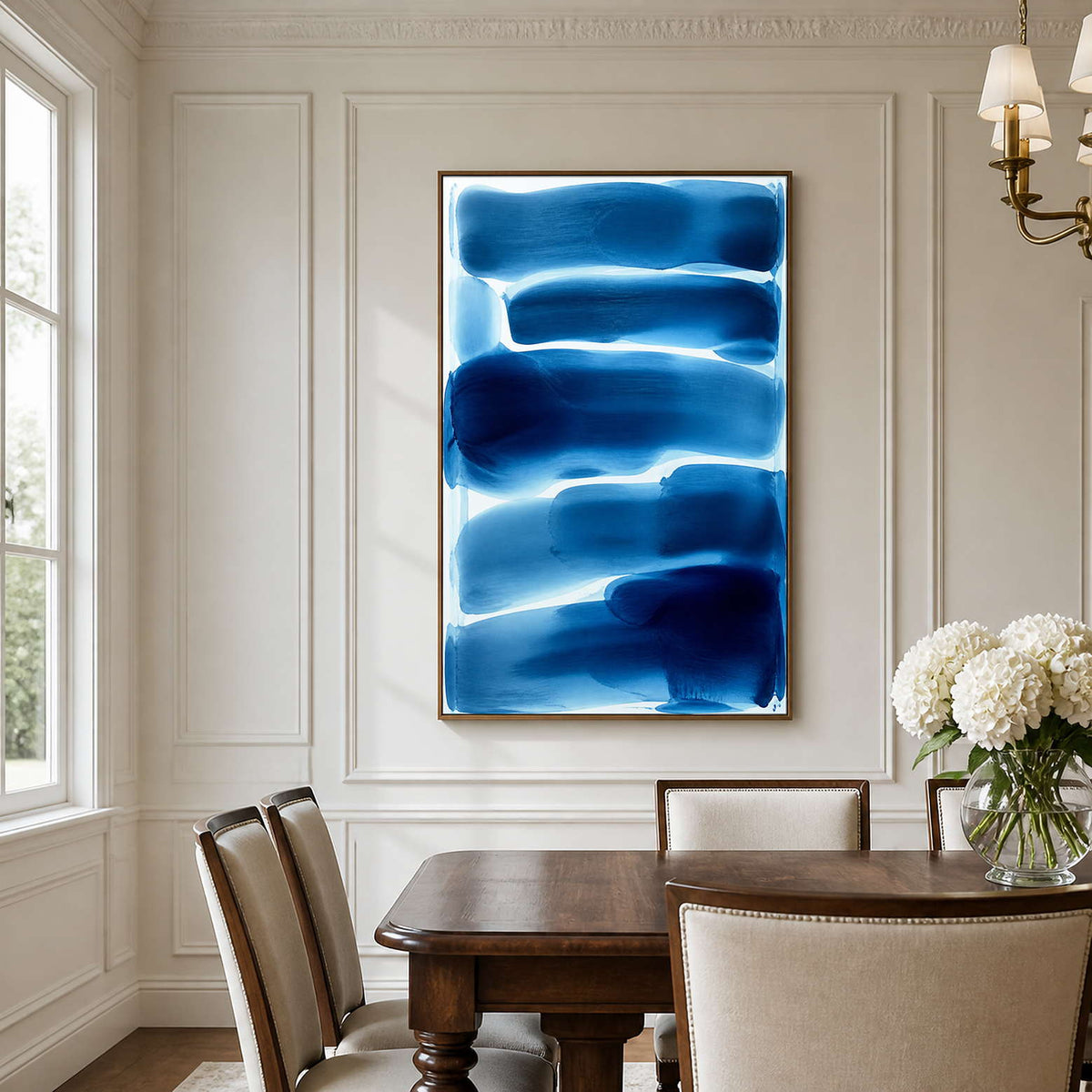 Vertical blue and white abstract art brings clear color to an elegant dining room.