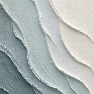 Close-up of layered blue-gray and chalk-white palette-knife texture.