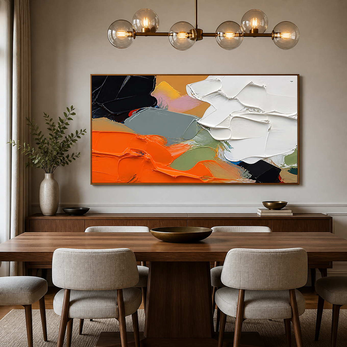 Orange and white abstract art adds sculptural color to an elegant dining room.