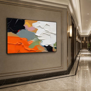 Horizontal orange and white abstract wall art displayed along a refined hallway.