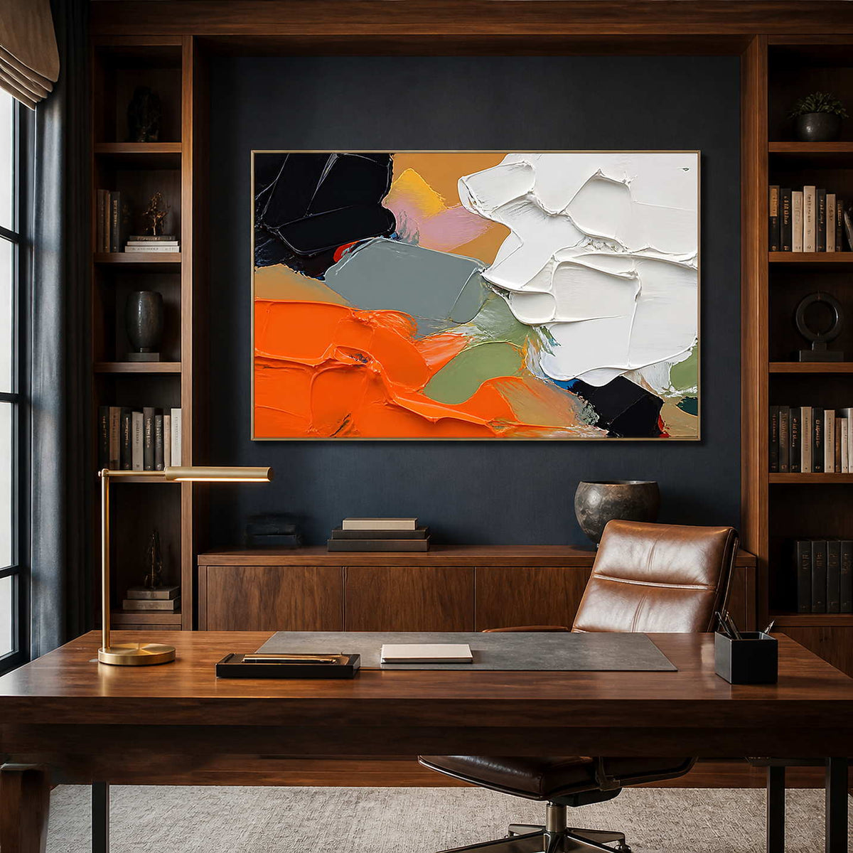 Modern textured abstract painting brings vivid contrast to a dark wood office.