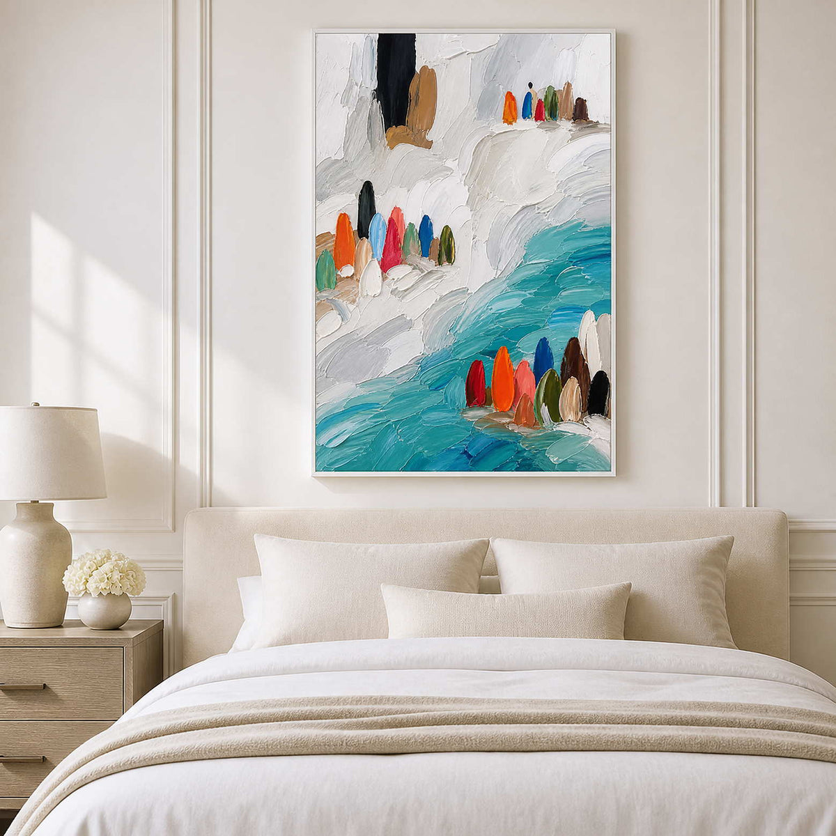 Turquoise and white abstract canvas adds airy color above the bed.