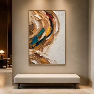 Sculptural abstract wall art displayed above a minimalist gallery bench.