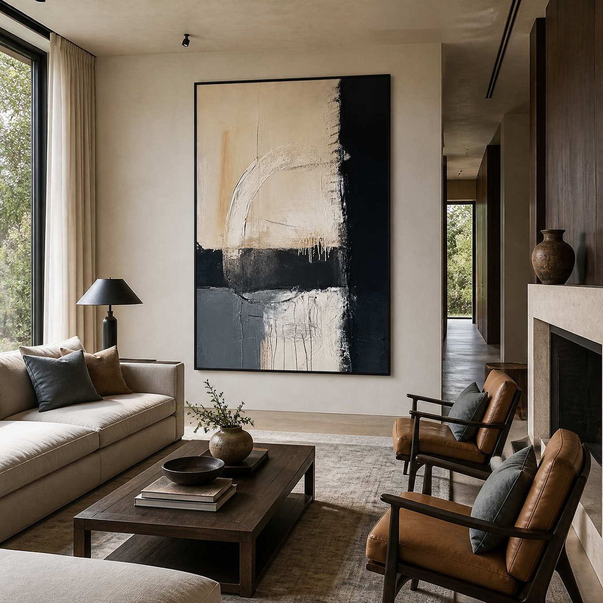 Where Day Meets Night in a black frame beside a cream sofa and leather chairs, with beige, gray-blue, and dark bands in a modern living room.