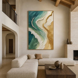 Emerald textured coastal wall art in a warm double-height living room.