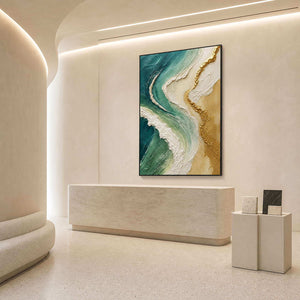 Emerald and gold textured artwork in an ivory showroom reception.