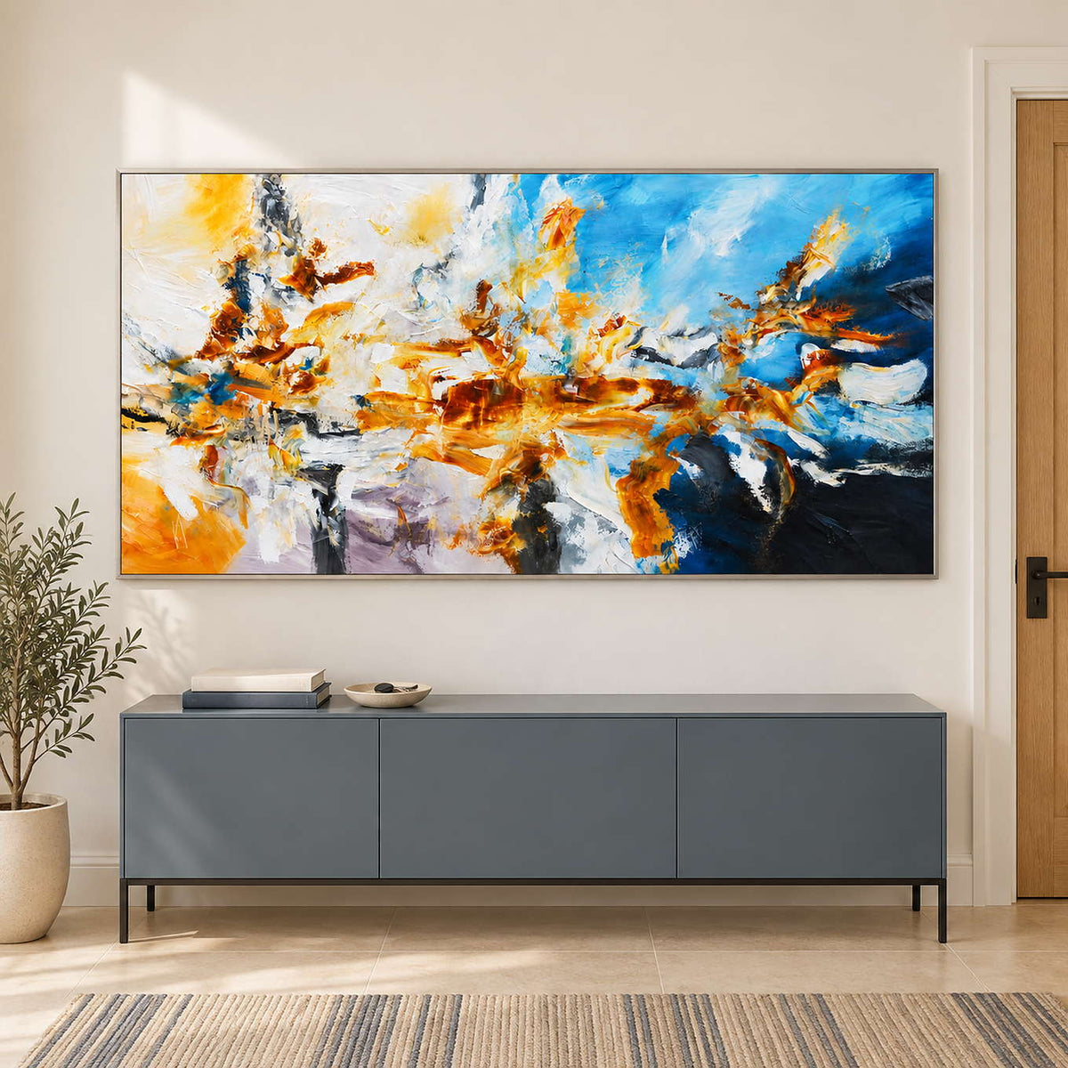 Wide colorful artwork above a gray sideboard near the entry.