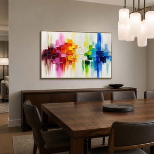 Vibrant modern abstract wall art displayed in a dark wood dining room.