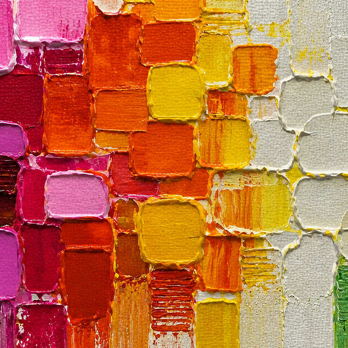 Close-up of thick pink, orange, yellow, and white hand-painted color blocks.