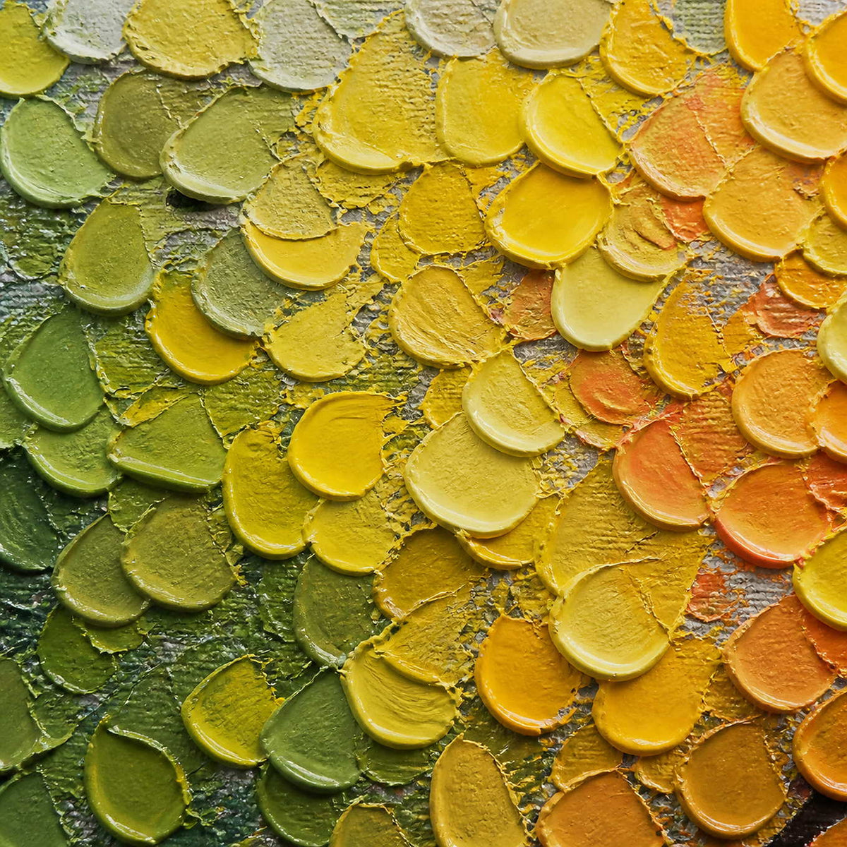 Close-up of raised green, yellow, and orange palette-knife leaves.