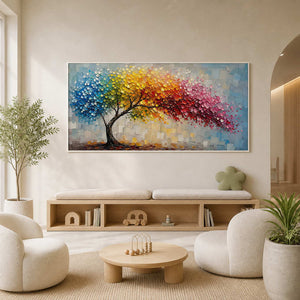 Colorful tree wall art displayed in a design-led pediatric wellness waiting room.