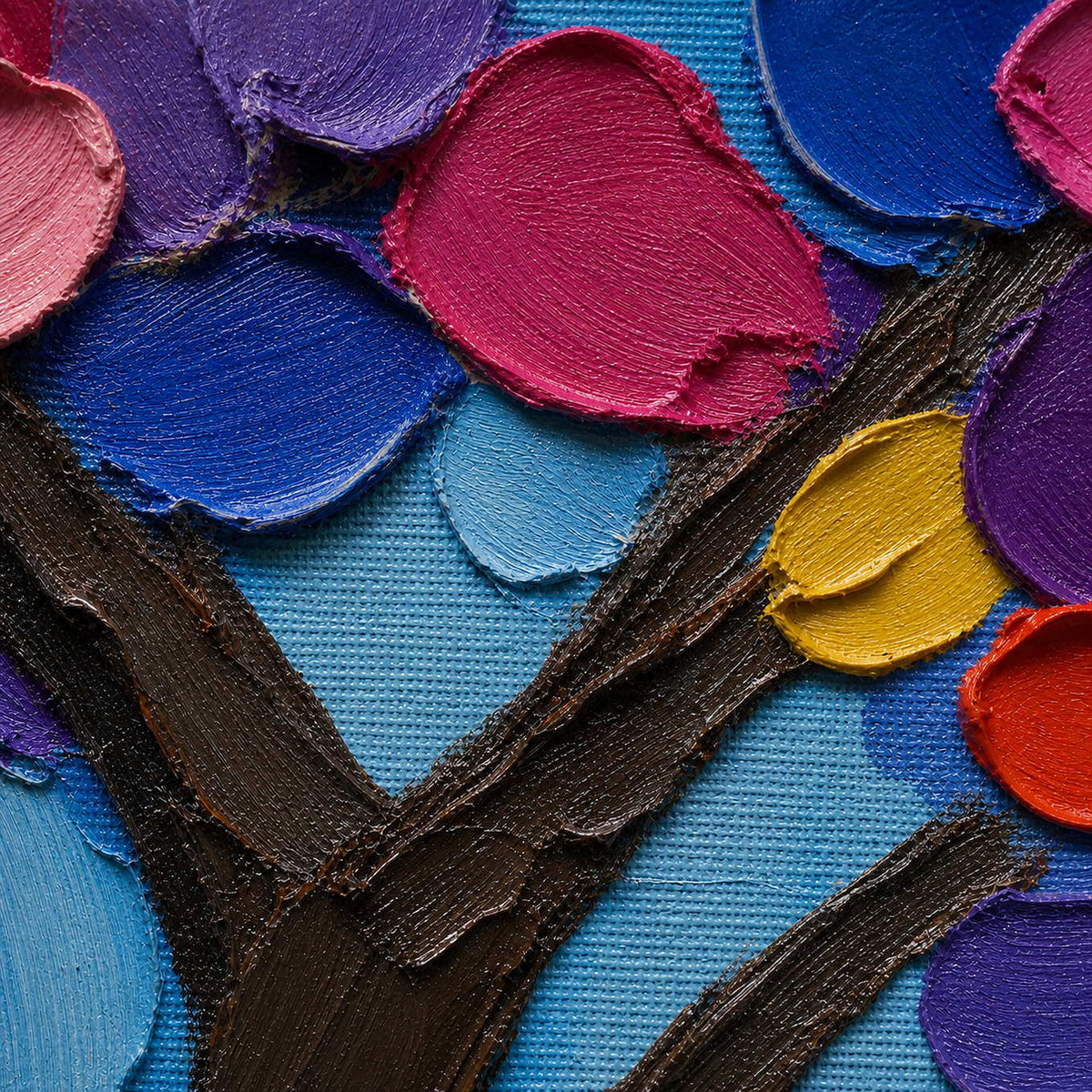 Close-up of thick blue, pink, violet, and gold palette-knife texture.
