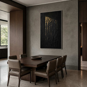 Dark textured artwork displayed above a smoke-gray walnut dining room.