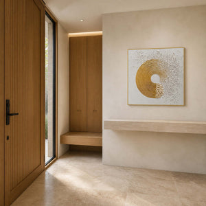 Square textured abstract painting in a bright modern entryway
