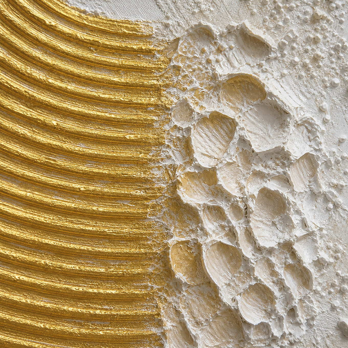 Close detail of sculpted gold ridges and ivory palette knife texture