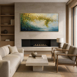 Golden and teal textured landscape wall art above a limestone fireplace.