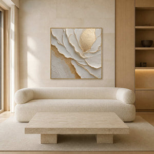 Ivory and gold floral wall art displayed in a cream stone living room.