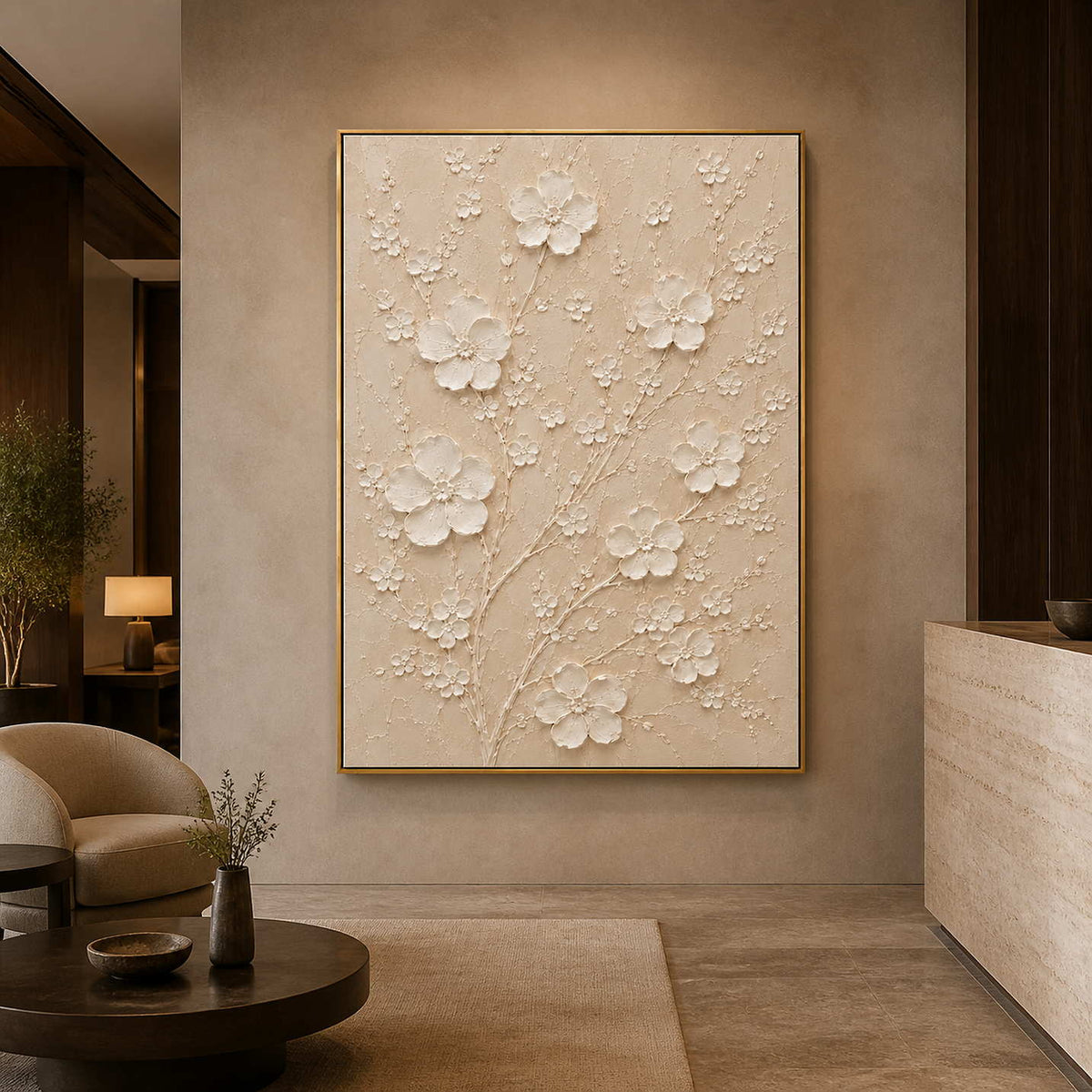Ivory floral relief artwork displayed in a boutique hotel lobby.
