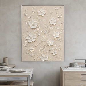 Minimalist white botanical art displayed in a bright creative studio.