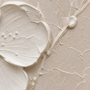 Close-up of raised ivory petals, stems, and fine palette-knife texture.